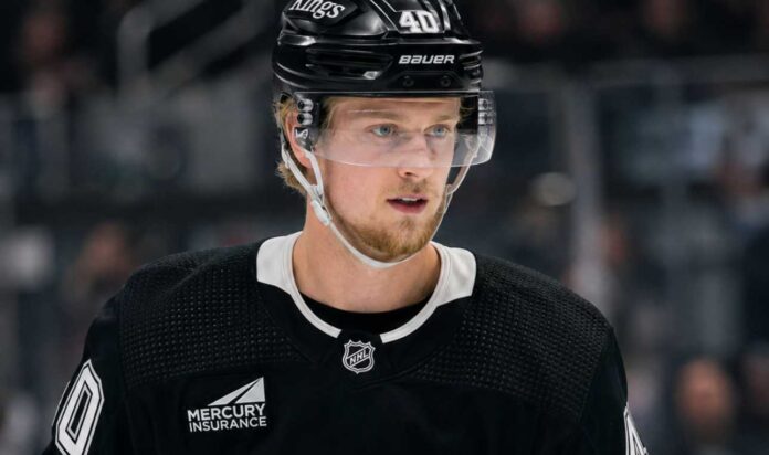 Elias Pettersson wearing a Los Angeles Kings home jersey and helmet amid trade speculation involving the Vancouver Canucks