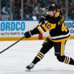 Elias Pettersson Linked to Pittsburgh Penguins in Blockbuster Trade Rumor Elias Pettersson wearing a Pittsburgh Penguins home jersey while taking a powerful shot during an NHL game