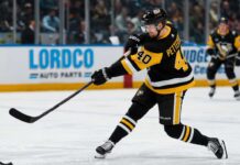 Elias Pettersson Linked to Pittsburgh Penguins in Blockbuster Trade Rumor Elias Pettersson wearing a Pittsburgh Penguins home jersey while taking a powerful shot during an NHL game