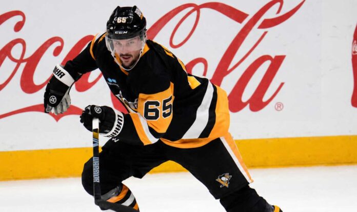 Erik Karlsson skates for the Pittsburgh Penguins as trade rumors link the veteran defenseman to a possible Ottawa Senators reunion.