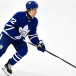 Gavin McKenna Fantasy Hockey Projection: Can the Toronto Maple Leafs Rookie Reach 70 Points? Gavin McKenna skating in a Toronto Maple Leafs home uniform for his 2026-27 NHL Fantasy Hockey rookie projection.