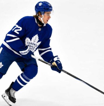 Gavin McKenna Fantasy Hockey Projection: Can the Toronto Maple Leafs Rookie Reach 70 Points? Gavin McKenna skating in a Toronto Maple Leafs home uniform for his 2026-27 NHL Fantasy Hockey rookie projection.