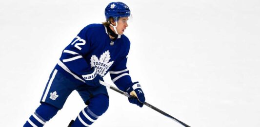 Gavin McKenna Fantasy Hockey Projection: Can the Toronto Maple Leafs Rookie Reach 70 Points? Gavin McKenna skating in a Toronto Maple Leafs home uniform for his 2026-27 NHL Fantasy Hockey rookie projection.