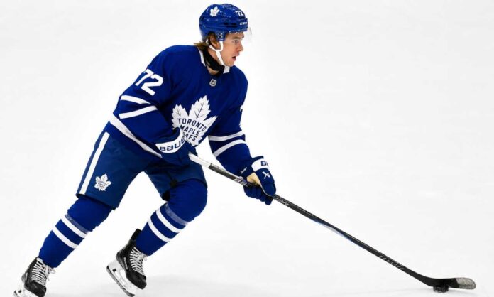 gavin-mckenna-maple-leafs-fantasy-hockey-projection-2026-27 Gavin McKenna skating in a Toronto Maple Leafs home uniform for his 2026-27 NHL Fantasy Hockey rookie projection.