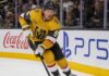 Jack Eichel Fantasy Hockey Projection: Will He Reach 100 Points in 2026-27? Jack Eichel skating for the Vegas Golden Knights beside Coca-Cola and PS5 rink-board ads during his projected 2026-27 Fantasy Hockey season.