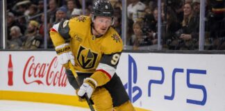 Jack Eichel skating for the Vegas Golden Knights beside Coca-Cola and PS5 rink-board ads during his projected 2026-27 Fantasy Hockey season.