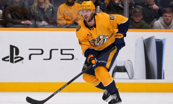 jonathan-marchessault-nashville-predators-trade-rumors-2026 Jonathan Marchessault skating for the Nashville Predators amid NHL trade rumors and speculation about his future in Nashville