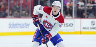 Lane Hutson Point Projections for the 2026–27 NHL Season Lane Hutson skating for the Montreal Canadiens during a game ahead of his 2026-27 Fantasy Hockey point projection.