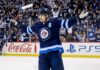 Mark Scheifele Point Projections 2026-27: Winnipeg Jets Fantasy Hockey Outlook Mark Scheifele celebrates for the Winnipeg Jets with Coca-Cola and PS5 board ads in a 2026-27 fantasy hockey point projections preview