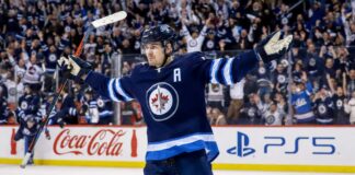 Mark Scheifele celebrates for the Winnipeg Jets with Coca-Cola and PS5 board ads in a 2026-27 fantasy hockey point projections preview