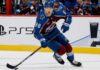 Martin Necas Point Projections 2026-27: Colorado Avalanche Fantasy Outlook Martin Necas skates for the Colorado Avalanche beside a PS5 rink-board ad ahead of his 2026-27 fantasy hockey point projection.