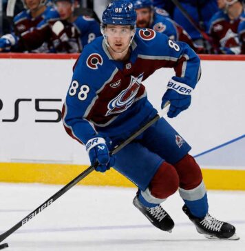 Martin Necas Point Projections 2026-27: Colorado Avalanche Fantasy Outlook Martin Necas skates for the Colorado Avalanche beside a PS5 rink-board ad ahead of his 2026-27 fantasy hockey point projection.