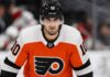 Philadelphia Flyers Linked to Seattle Kraken Center Matty Beniers Matty Beniers wearing a Philadelphia Flyers home jersey and helmet amid NHL trade rumors linking the Seattle Kraken center to Philadelphia.