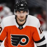 Philadelphia Flyers Linked to Seattle Kraken Center Matty Beniers Matty Beniers wearing a Philadelphia Flyers home jersey and helmet amid NHL trade rumors linking the Seattle Kraken center to Philadelphia.