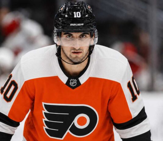 Philadelphia Flyers Linked to Seattle Kraken Center Matty Beniers Matty Beniers wearing a Philadelphia Flyers home jersey and helmet amid NHL trade rumors linking the Seattle Kraken center to Philadelphia.