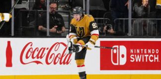 Mitch Marner Point Projections 2026-27: Vegas Golden Knights Fantasy Outlook Mitch Marner celebrates for the Vegas Golden Knights beside Coca-Cola and Nintendo Switch board ads in a 2026-27 fantasy hockey projection.