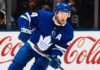 Morgan Rielly’s Four-Team Trade List Leaves the Maple Leafs Facing an Awkward Decision Morgan Rielly skating in a Toronto Maple Leafs home jersey as trade rumours surround his reported four-team destination list.