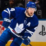 Morgan Rielly Likely to Stay With Toronto Maple Leafs as Trade Market Cools Morgan Rielly skating in a Toronto Maple Leafs home jersey as trade rumors suggest the veteran defenseman could remain in Toronto for the 2026-27 NHL season.