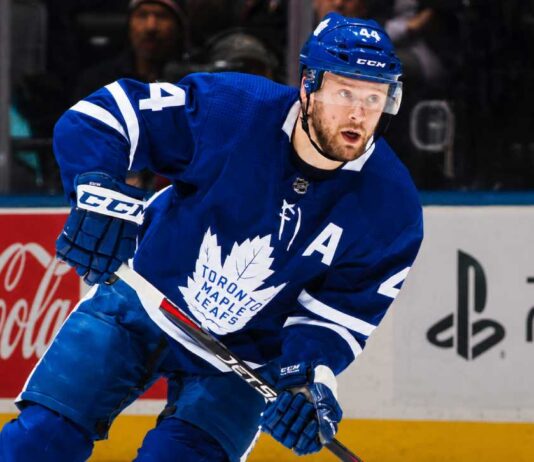 Morgan Rielly Likely to Stay With Toronto Maple Leafs as Trade Market Cools Morgan Rielly skating in a Toronto Maple Leafs home jersey as trade rumors suggest the veteran defenseman could remain in Toronto for the 2026-27 NHL season.