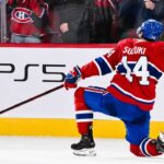 Nick Suzuki Point Projections 2026-27: Montreal Canadiens Fantasy Hockey Outlook Nick Suzuki celebrates for the Montreal Canadiens with PS5 board ad in 2026-27 fantasy hockey point projections preview