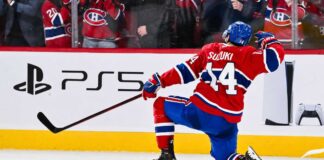 Nick Suzuki Point Projections 2026-27: Montreal Canadiens Fantasy Hockey Outlook Nick Suzuki celebrates for the Montreal Canadiens with PS5 board ad in 2026-27 fantasy hockey point projections preview