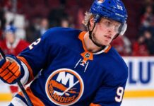 Patrik Laine to the New York Islanders? Breaking Down the Latest Rumor Patrik Laine wearing a New York Islanders home jersey and helmet as he is linked to the team in NHL free agency rumors.