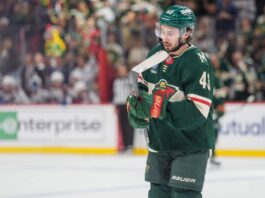 Will the Minnesota Wild Re-Sign Quinn Hughes? Contract Rumors Point to One Major Obstacle Quinn Hughes in a Minnesota Wild jersey during contract extension rumors involving a potential $17 million to $18 million annual salary
