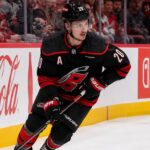 Sebastian Aho Point Projections 2026-27: Carolina Hurricanes Fantasy Outlook Sebastian Aho skating for the Carolina Hurricanes as a left-shot beside Coca-Cola and Nintendo Switch ads in a 2026-27 fantasy hockey projection