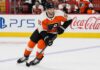 Shane Wright skates in a Philadelphia Flyers home jersey as Seattle Kraken trade rumors link the young center to Philadelphia.