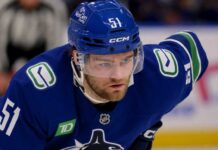 Shane Wright Reportedly Prefers Vancouver Canucks as Kraken Trade Talks Heat Up Shane Wright wearing a Vancouver Canucks home jersey amid trade rumors involving the Seattle Kraken.