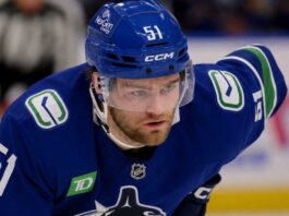 Shane Wright Reportedly Prefers Vancouver Canucks as Kraken Trade Talks Heat Up Shane Wright wearing a Vancouver Canucks home jersey amid trade rumors involving the Seattle Kraken.