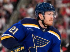 Blues Still Want Alexander Nikishin, but Carolina’s Asking Price Creates a Major Problem Alexander Nikishin wearing a St. Louis Blues home jersey amid NHL trade rumors involving the Carolina Hurricanes