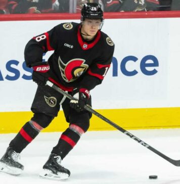 Tim Stützle Point Projections 2026-27: Is a 90-Point Fantasy Breakout Coming? Tim Stützle skating with the puck for the Ottawa Senators during an NHL game ahead of his 2026-27 fantasy hockey point projection.
