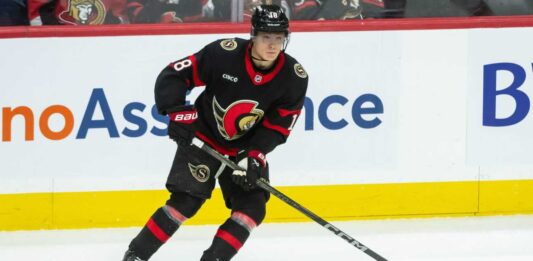 Tim Stützle Point Projections 2026-27: Is a 90-Point Fantasy Breakout Coming? Tim Stützle skating with the puck for the Ottawa Senators during an NHL game ahead of his 2026-27 fantasy hockey point projection.