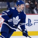 Zach Werenski Maple Leafs Trade Rumor: Blue Jackets Star Rejects Dallas Zach Werenski in a Toronto Maple Leafs jersey during NHL trade rumors linking the former Columbus Blue Jackets defenseman to Toronto