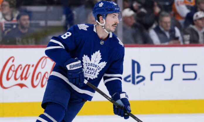 zach-werenski-maple-leafs-trade-rumor Zach Werenski in a Toronto Maple Leafs jersey during NHL trade rumors linking the former Columbus Blue Jackets defenseman to Toronto
