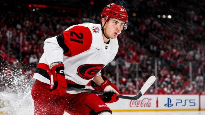 alexander-nikishin-carolina-hurricanes-trade-rumors Alexander Nikishin skating for the Carolina Hurricanes amid NHL trade rumors and RFA contract speculation.