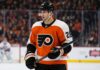 Alexander Romanov in a Philadelphia Flyers home jersey as the New York Islanders defenseman is linked to Philadelphia in NHL trade rumors.
