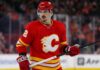 Arber Xhekaj Linked to Calgary Flames as Canadiens Face Major Decision Arber Xhekaj wearing a Calgary Flames home jersey amid NHL trade rumors involving the Montreal Canadiens