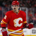 Arber Xhekaj Linked to Calgary Flames as Canadiens Face Major Decision Arber Xhekaj wearing a Calgary Flames home jersey amid NHL trade rumors involving the Montreal Canadiens