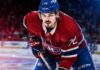 Arber Xhekaj in a Montreal Canadiens jersey as NHL trade rumors raise questions about his future with the Canadiens.