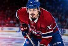 Arber Xhekaj in a Montreal Canadiens jersey as NHL trade rumors raise questions about his future with the Canadiens.