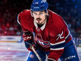 Arber Xhekaj in a Montreal Canadiens jersey as NHL trade rumors raise questions about his future with the Canadiens.