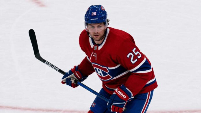 brandon-carlo-montreal-canadiens-trade-rumors-2026 Brandon Carlo in a Montreal Canadiens home jersey amid NHL trade rumors linking the St. Louis Blues defenceman to Montreal