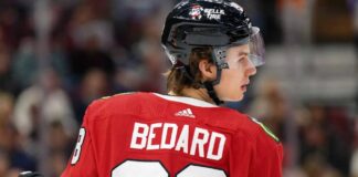 Connor Bedard skating for the Chicago Blackhawks during a 2026-27 fantasy hockey point projection.