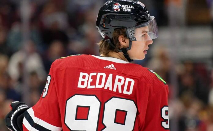 connor-bedard-chicago-blackhawks-fantasy-hockey-projection-2026-27 Connor Bedard skating for the Chicago Blackhawks during a 2026-27 fantasy hockey point projection.