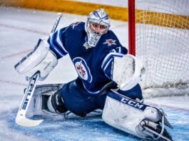 Connor Hellebuyck in net for the Winnipeg Jets as Buffalo Sabres trade rumors build ahead of NHL training camp.