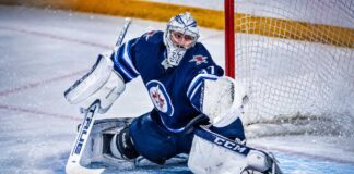 Connor Hellebuyck in net for the Winnipeg Jets as Buffalo Sabres trade rumors build ahead of NHL training camp.