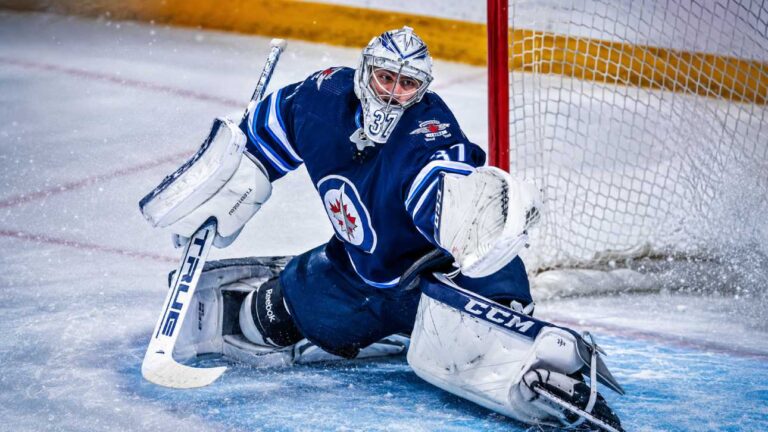 Connor Hellebuyck in net for the Winnipeg Jets as Buffalo Sabres trade rumors build ahead of NHL training camp.