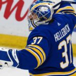 Connor Hellebuyck Trade Rumors: Could the Buffalo Sabres Reignite Blockbuster Jets Talks? Connor Hellebuyck pictured in a Buffalo Sabres home jersey and goalie equipment amid trade rumors linking the Winnipeg Jets star to Buffalo.